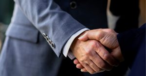 Two Businessman Shaking Hands - Scale up With Business Acquisitions - Advivo Business Advisors and Accountants Blog Image