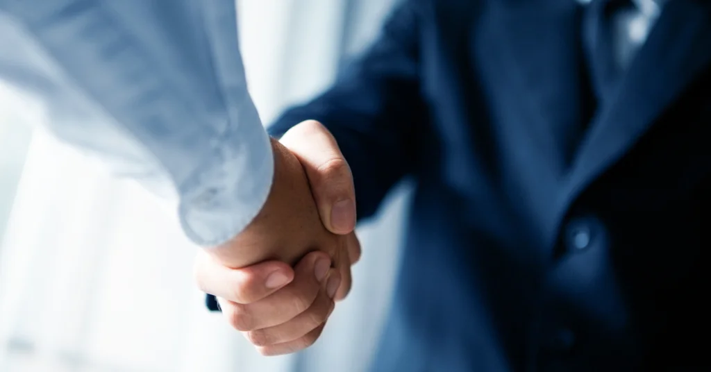 Two Person Shaking hands | Advivo